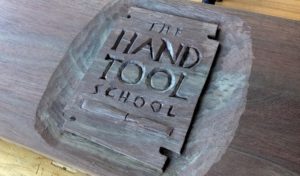 The Hand Tool School carved logo